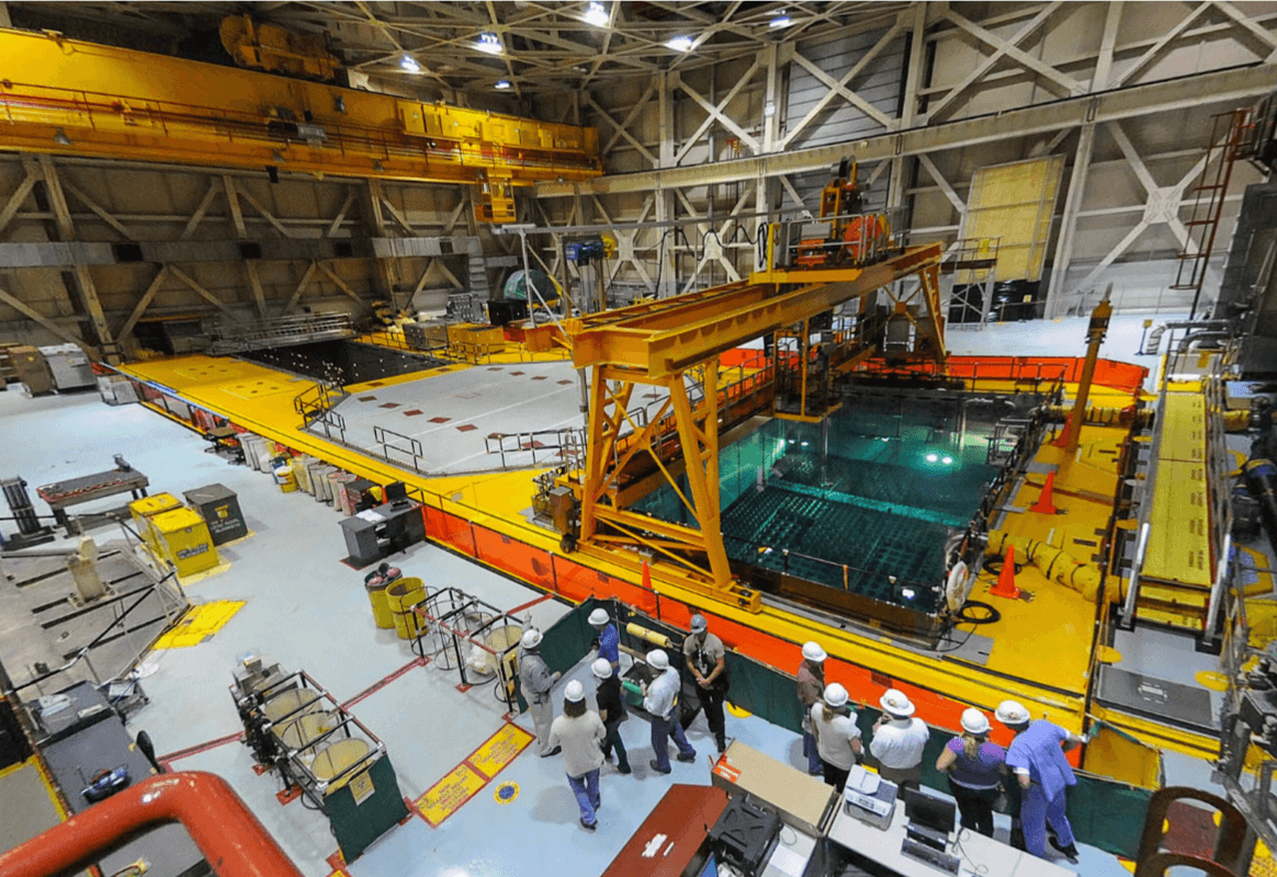 Underwater camera system monitoring fuel pool conditions and containment integrity